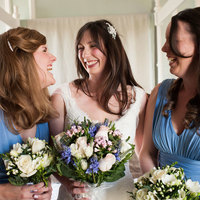 Kent Hair & Makeup Artist | The bridal party laughing at the Ramada hotel in Dover, Kent