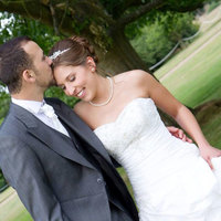 Kent Hair & Makeup Artist | Groom kissing the brides head