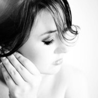 Kent Hair & Makeup Artist | Bride putting in her earrings