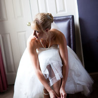 Kent Hair & Makeup Artist | Bride putting on her shoes