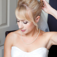 Kent Hair & Makeup Artist | Bride adjusting her veil